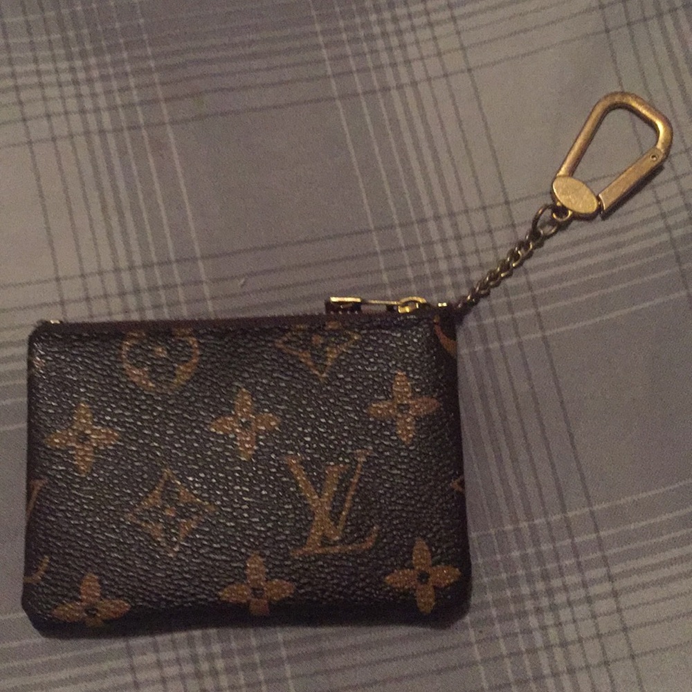 Louis Vuitton coin pouch .